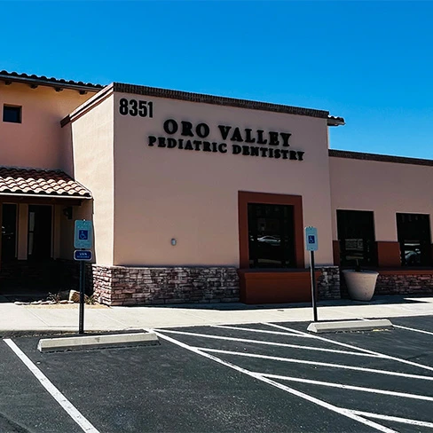 Exterior of Oro Valley Pediatric Dentistry building with clear blue sky